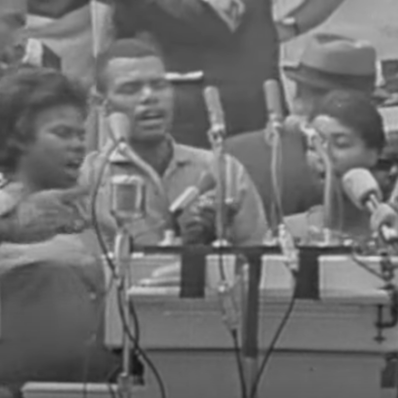 Black and white still of the Freedom Singers on Washington